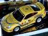 (B-Ware) BBurago Porsche 911 (996) GT3 gelb + Heidsieck 1:18