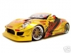 Muscle Machine Nissan 350Z 2004 gold + Decals 1:18