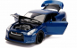 Preview: Jada Toys 253206003 Fast & Furious Brian's Nissan Skylie GT-R R35 + Figur 1:18 Modellauto