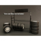 Preview: American Diorama 77518 Zubehör - Metall Reifengestell inkl. Reifen 1:18
