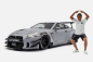 Preview: Nissan GT-R R35 grey with figure 1:18 Modelcar Solido 421186583