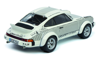 Schuco 450025100 Porsche 911 Carrera Rallye 4.0 Röhrl X 911weiss-schwarz 1:18 Modellauto