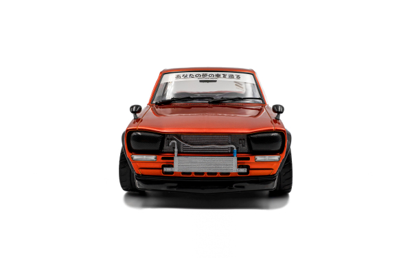 Nissan Skyline (C10) Hakosuka orange metallic 1970 1:18 Solido 421186528 Modelcar