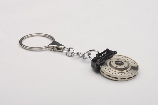 AUTOart Schlüsselanhänger Bremsscheibe schwarz mit Omegaring 40082